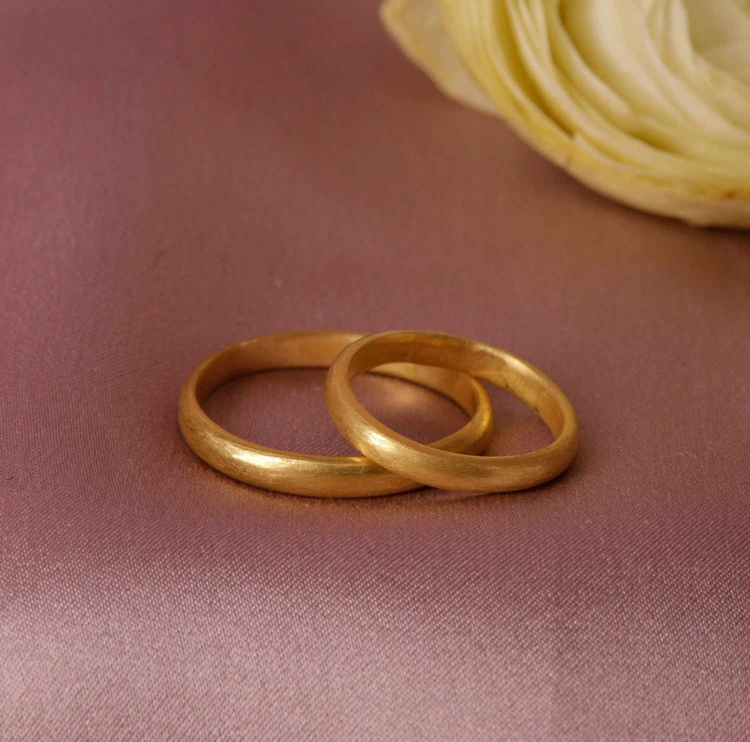 Classic wedding band with a soft, silky surface